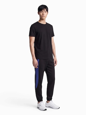 Nike Sportswear Дънки Tapered Leg Панталон 'TECH FLC PRO' в черно