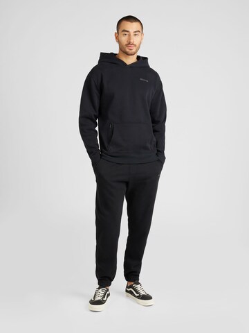 HOLLISTER Tapered Housut värissä musta