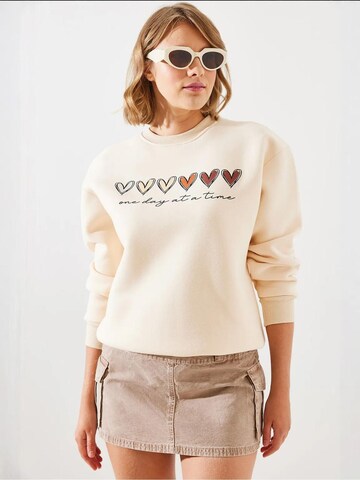 Felpa di Bianco Lucci in beige: frontale