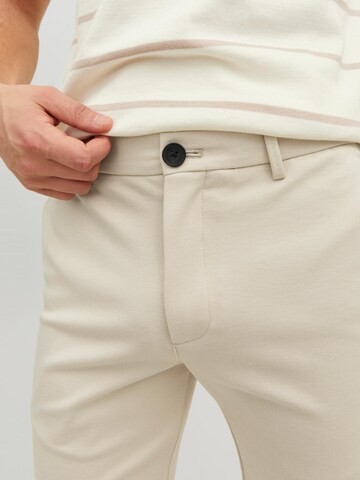 Regular Pantalon chino 'Phil' JACK & JONES en beige