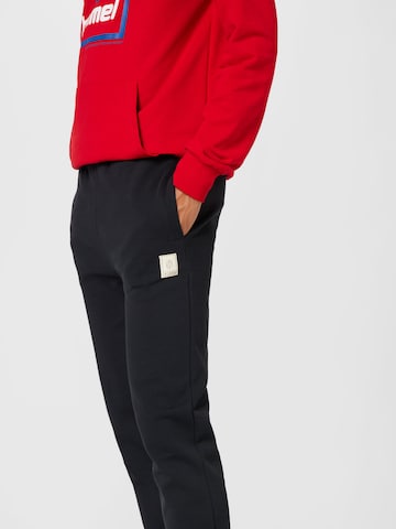 Hummel Slim fit Workout Pants in Black