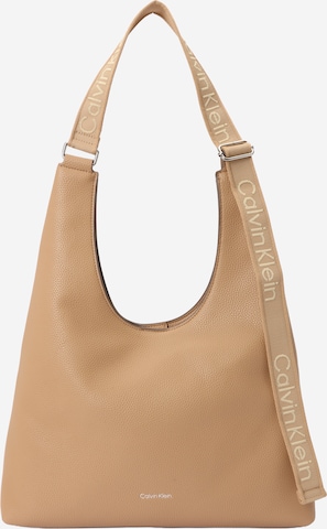 Sac bandoulière Calvin Klein en marron : devant