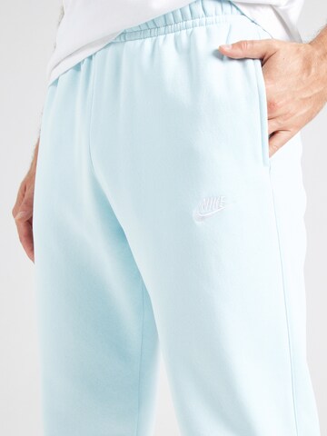 Tapered Pantaloni 'Club Fleece' de la Nike Sportswear pe albastru