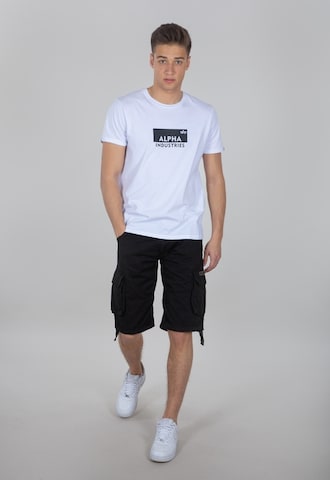 ALPHA INDUSTRIES Loosefit Παντελόνι 'Jet' σε μαύρο