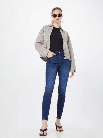 FRAME Skinny Jeans in Blau