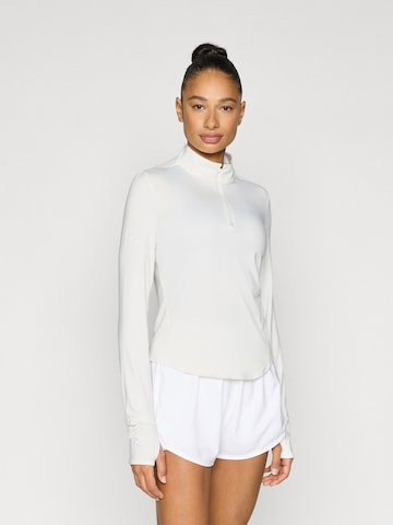 NIKE Функциональная футболка 'Swift' в Бежевый: спереди