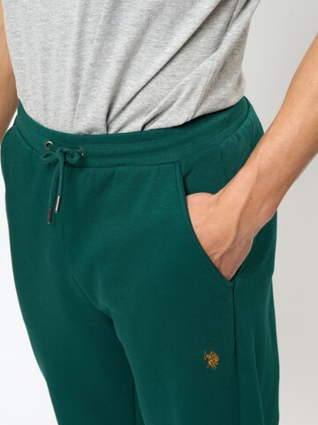U.S. POLO ASSN. Tapered Housut 'Terkel' värissä vihreä