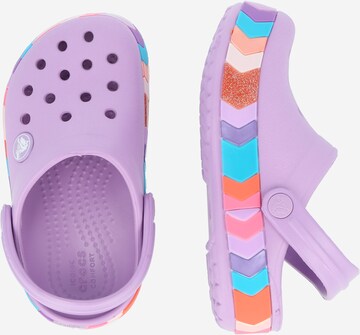 Chaussures ouvertes Crocs en violet