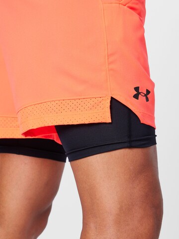 UNDER ARMOUR Normální Sportovní kalhoty 'Vanish' – oranžová