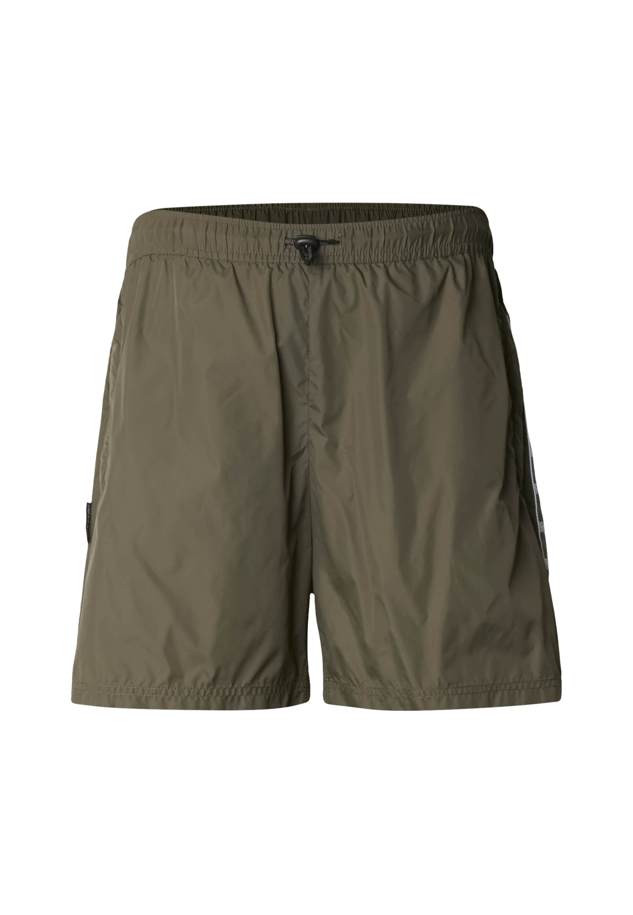 Unfair Athletics Loosefit Broek in Groen: voorkant