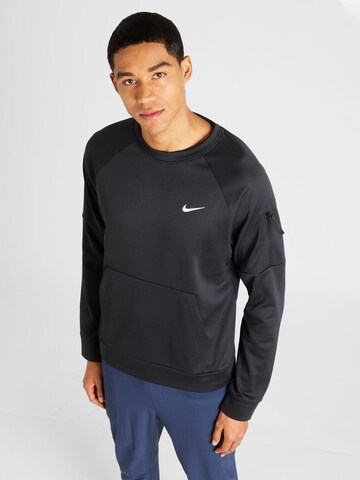 NIKE Sports sweatshirt in Black: front