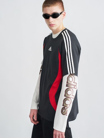 ADIDAS ORIGINALS Paita 'TEAMGEIST' värissä musta