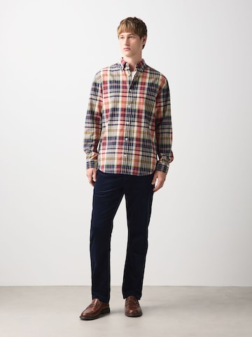 Next Slim fit Trousers 'Motionflex' in Blue