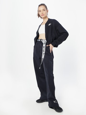 Nike Sportswear Loose fit Trousers 'Air' in Black