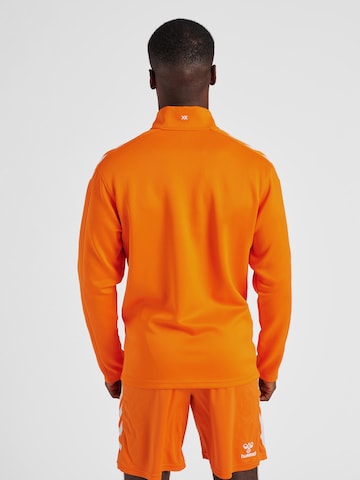 Hummel Sports sweat jacket 'POLY' in Orange
