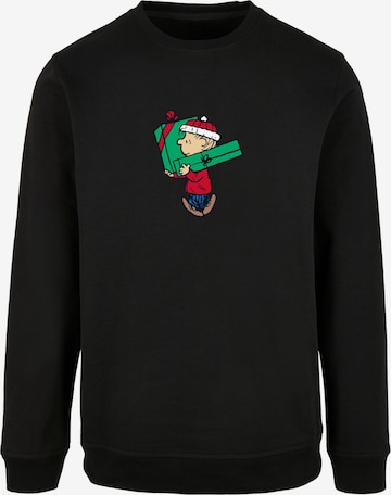 Sweat-shirt 'Peanuts Charlies Presents' Merchcode en noir : devant