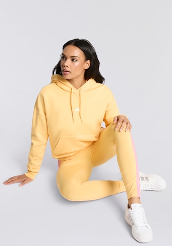 ADIDAS SPORTSWEAR Skinny Workout Pants 'Essentials' in Yellow