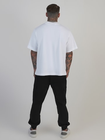 Effilé Pantalon cargo SikSilk en noir