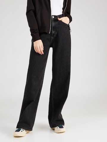 Tommy Jeans Zvonové kalhoty Džíny 'CLAIRE' – černá: přední strana