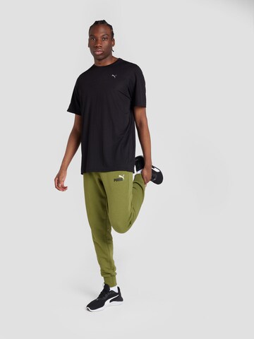 Effilé Pantalon de sport 'ESS+' PUMA en vert