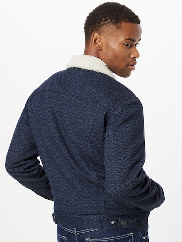 LEVI'S ® Between-season jacket 'Type 3 Sherpa Trucker' in Blue