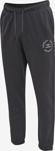 Effilé Pantalon de sport Hummel en noir