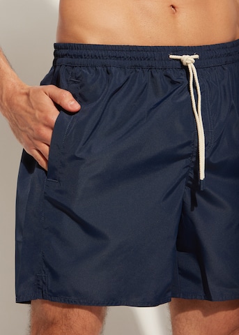 CALZEDONIA Board Shorts in Blue: front