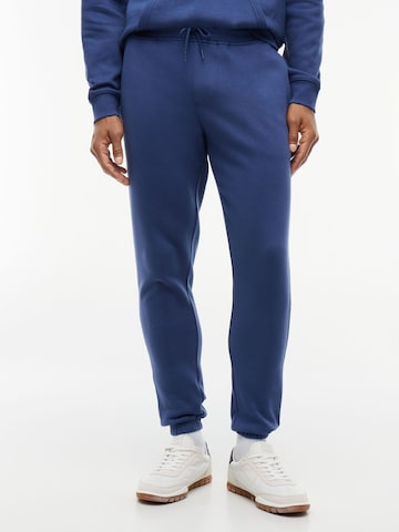 Tommy Jeans Tapered Hose in Blau: Vorderseite