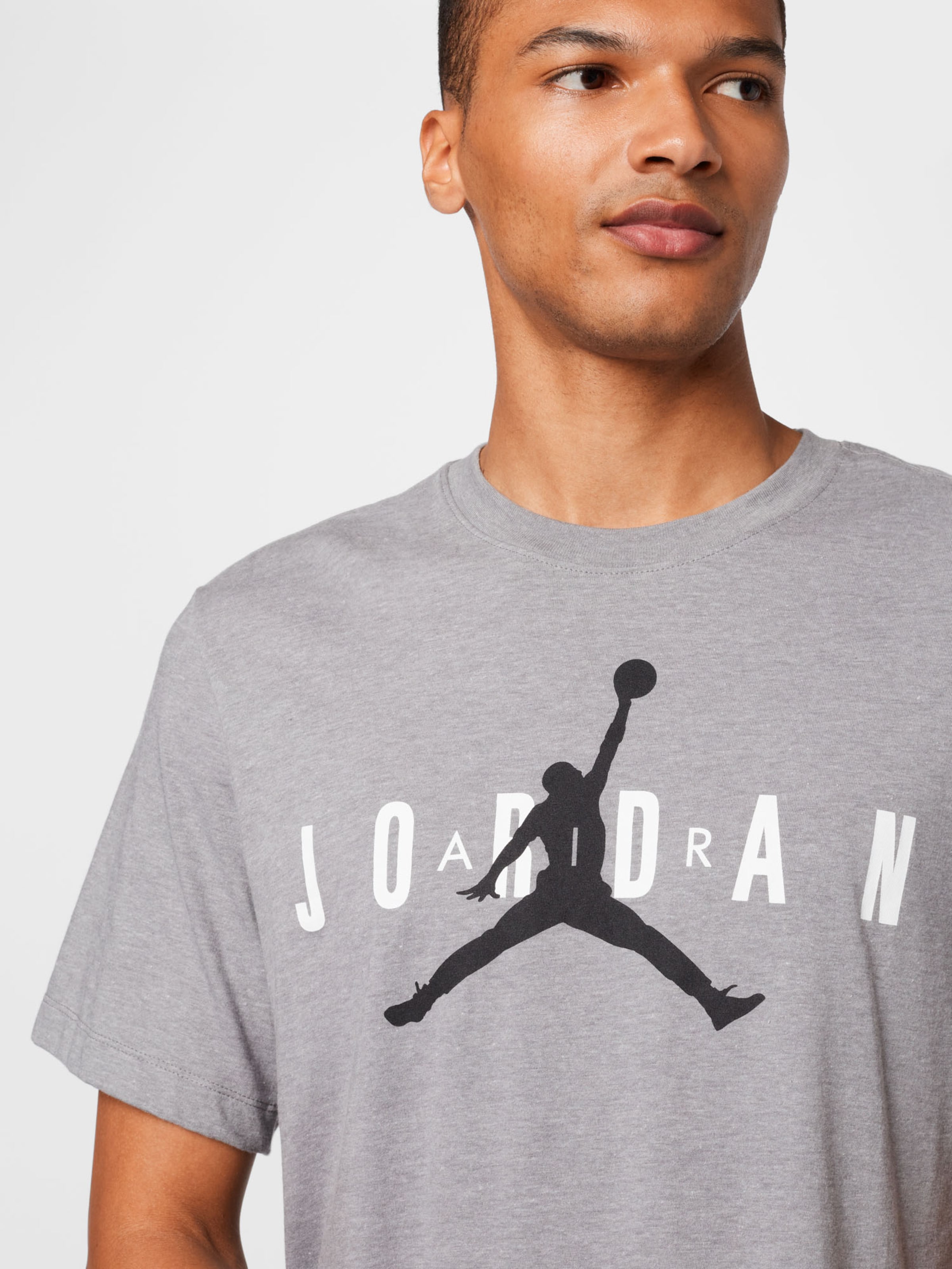 Sport T-Shirt fonctionnel Jordan Air Wordmark Jordan en Gris Chiné 
