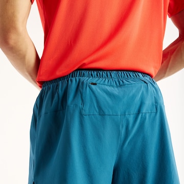 new balance Loosefit Sportbroek 'RC Essential' in Blauw
