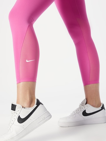 NIKE Skinny Spodnie sportowe 'One' w kolorze różowy