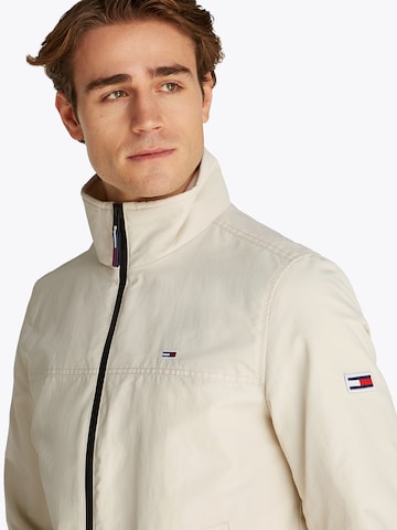 Tommy Jeans Between-Season Jacket 'ESSENTIAL' in Beige