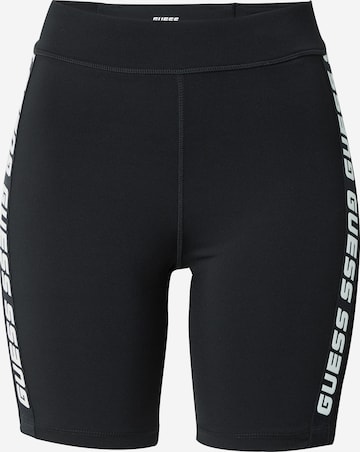 GUESS - Pantalón deportivo en negro: frente