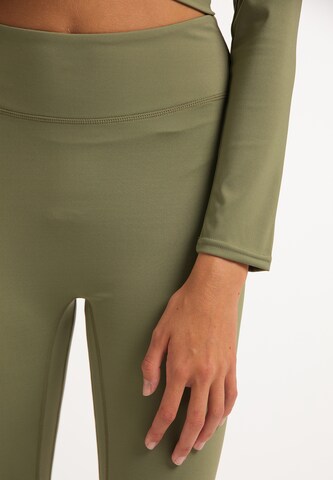 TALENCE - Skinny Leggings en verde