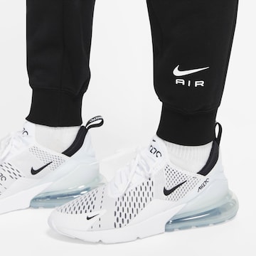 Nike SportswearTapered Hlače 'Air' - crna boja