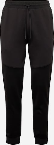 PUMA Tapered Pants in Black: front