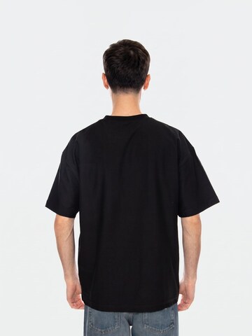 Carhartt WIP Koszulka 'WIP LABEL' w kolorze czarny