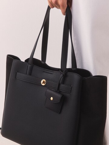 Next Shopper i sort