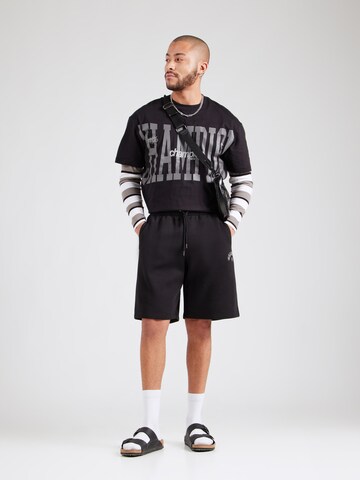 Loosefit Pantaloni di Champion Authentic Athletic Apparel in nero