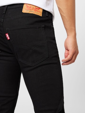 LEVI'S ® Tapered Jeans '502 Taper Hi Ball' in Zwart