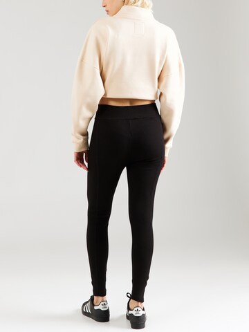 regular Leggings di ALPHA INDUSTRIES in nero