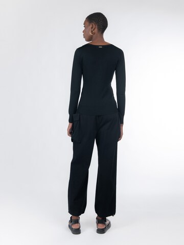 Influencer Плетена жилетка в черно