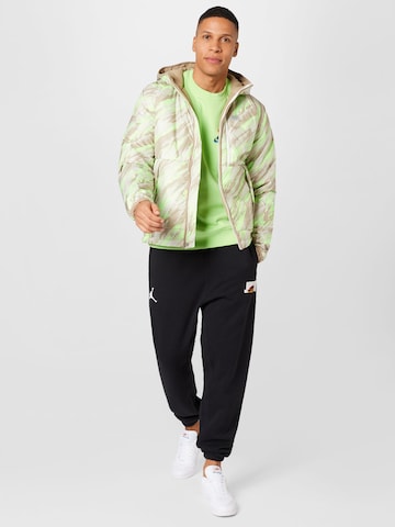 Nike SportswearPrijelazna jakna - zelena boja