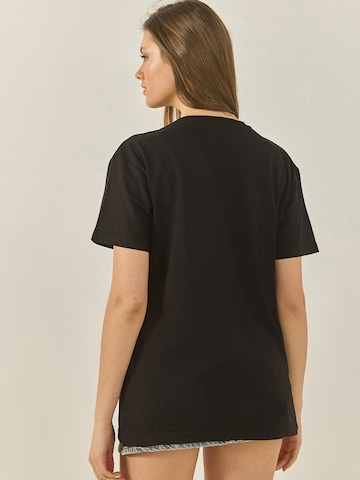 Bianco Lucci T-shirt i svart