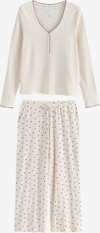 Pijama de la Next pe bej: față