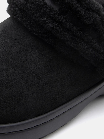 Clogs di Crocs in nero