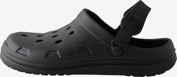 Next Puukengät & Crocks-jalkineet värissä musta: etupuoli