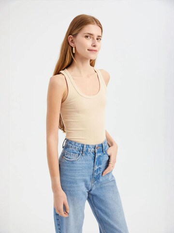 Top di Hiccup in beige