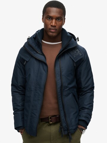 Veste mi-saison Superdry en bleu : devant