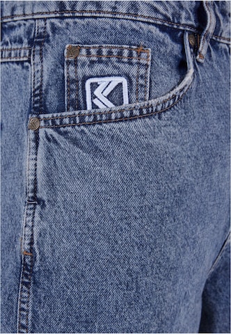 Karl Kani Flared Jeans ' KMI-PL063-091-11 KK Retro Baggy Workwear Denim ' in Blau